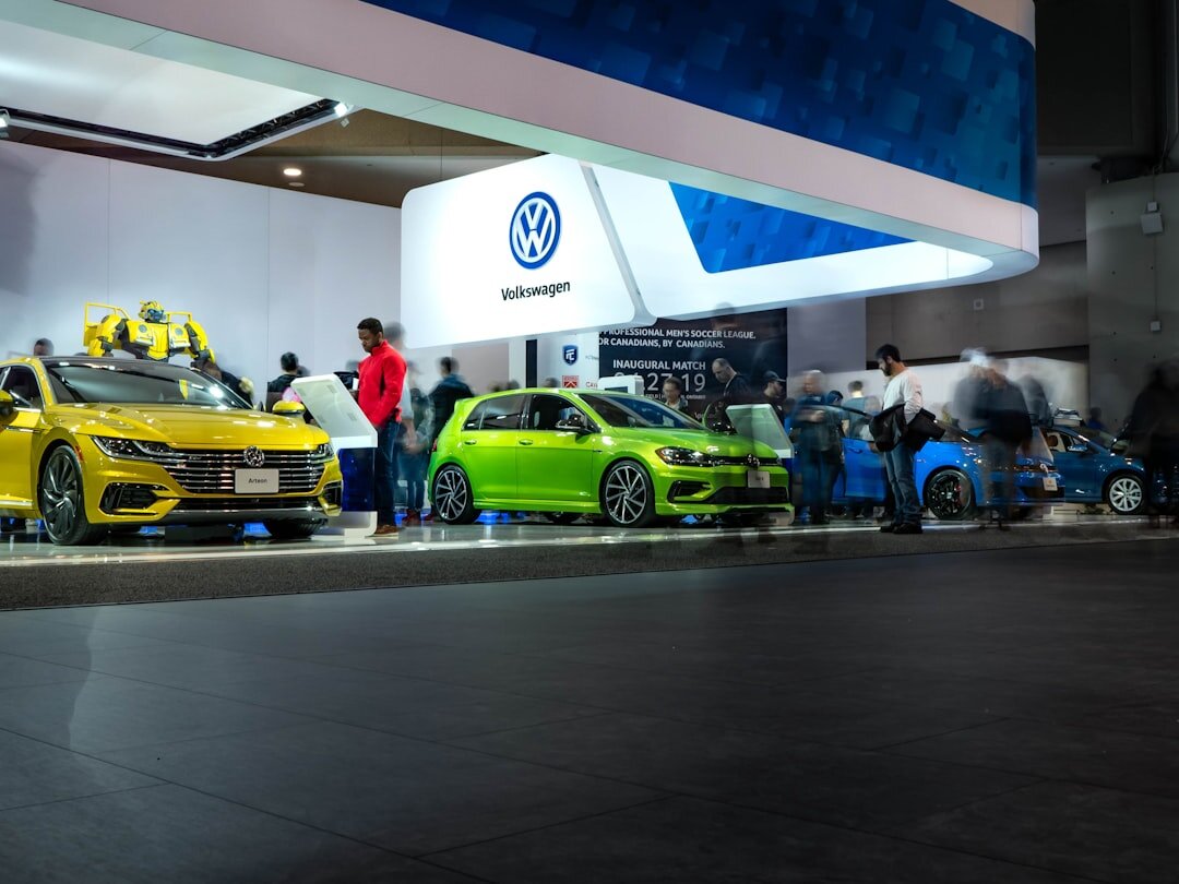 Crowd viewing classic automobiles at an exhibition hall in Montevideo